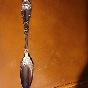 Antique Rogers silver-plated serving spoon with patent no. Circ. 1881